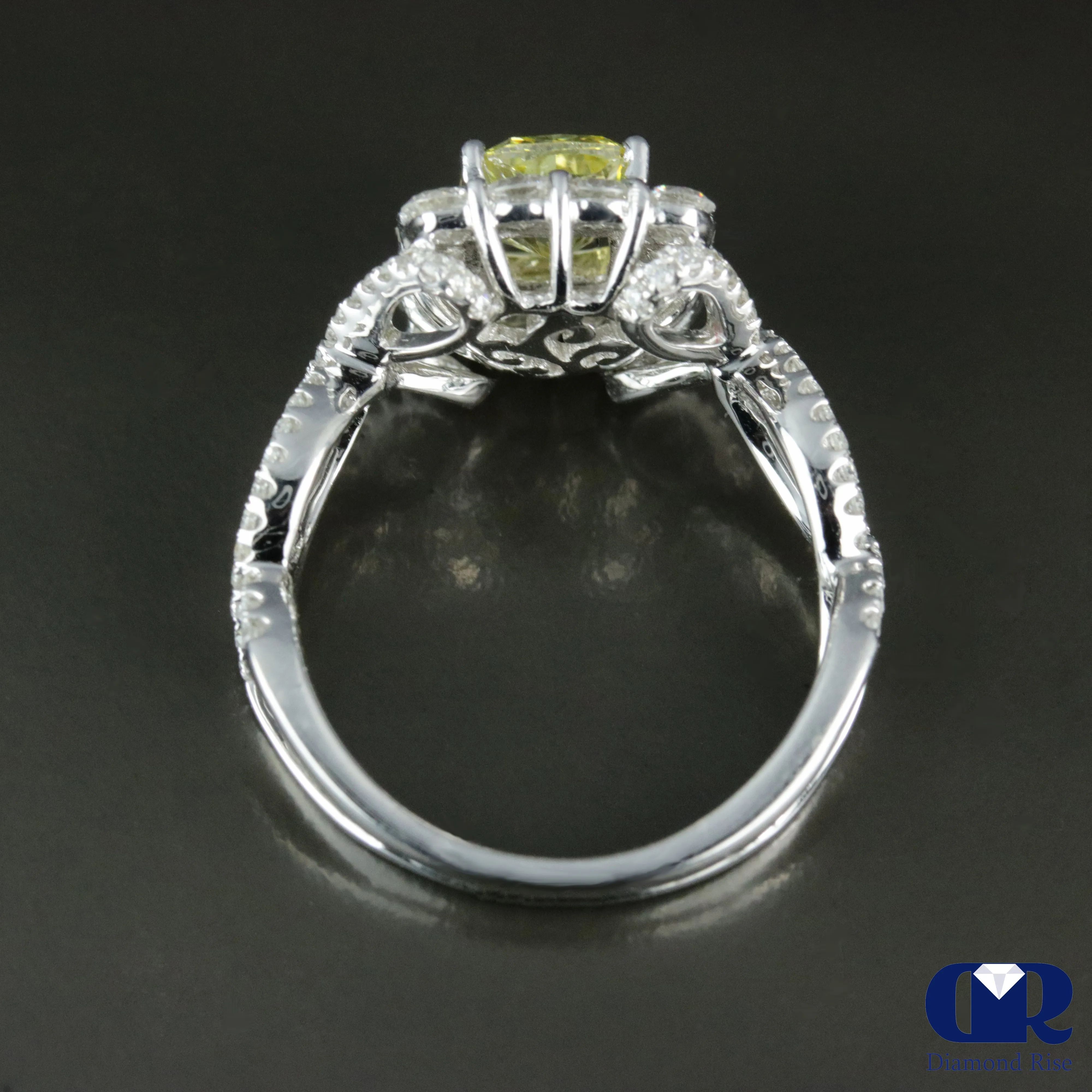 2.45 Carat Fancy Yellow Cushion Cut Diamond Twisted Engagement Ring In 18K White Gold