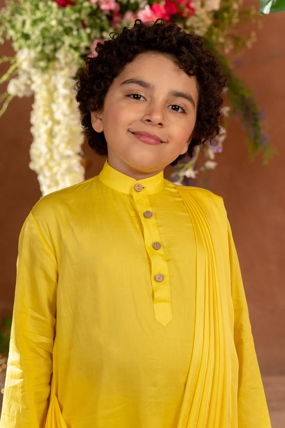 Hvar - 

Drape German  Satin Yellow Kurta Trouser